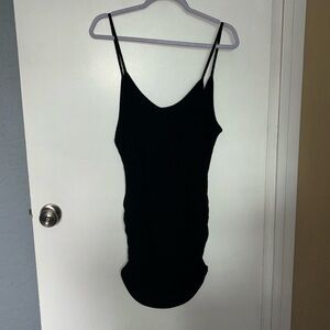 Size large, black knitted dress, cami top straps, with scrunched sides at bottom